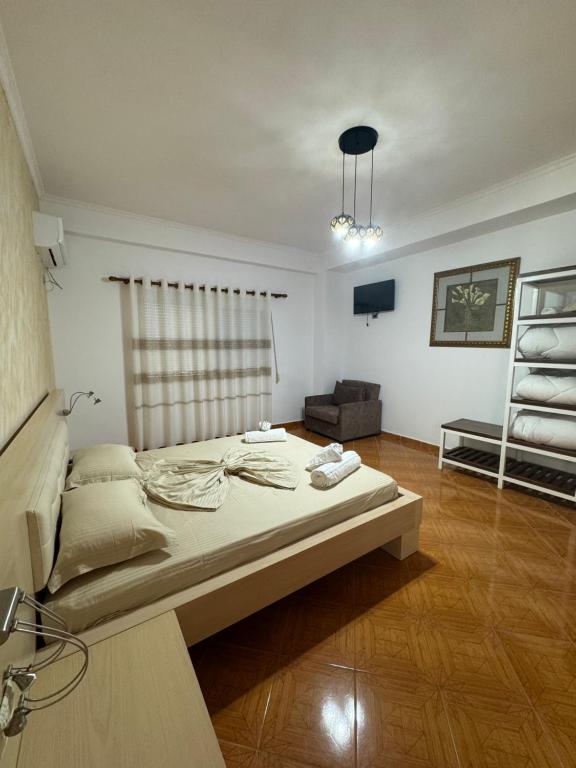 Llit o llits en una habitació de Hotel Frida