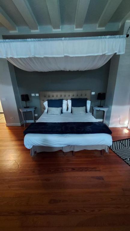 Postel nebo postele na pokoji v ubytování Villa Toscanini