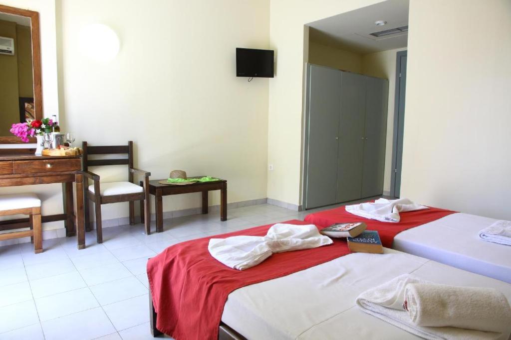 Postel nebo postele na pokoji v ubytování Porto Plazza Hotel