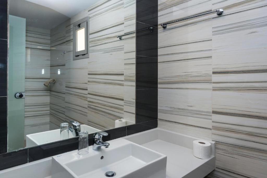 Koupelna v ubytování Porto Plazza Hotel