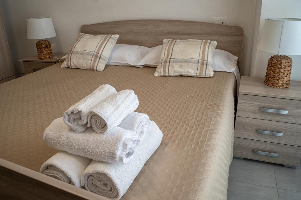 Postel nebo postele na pokoji v ubytování B&B Santa Filomena