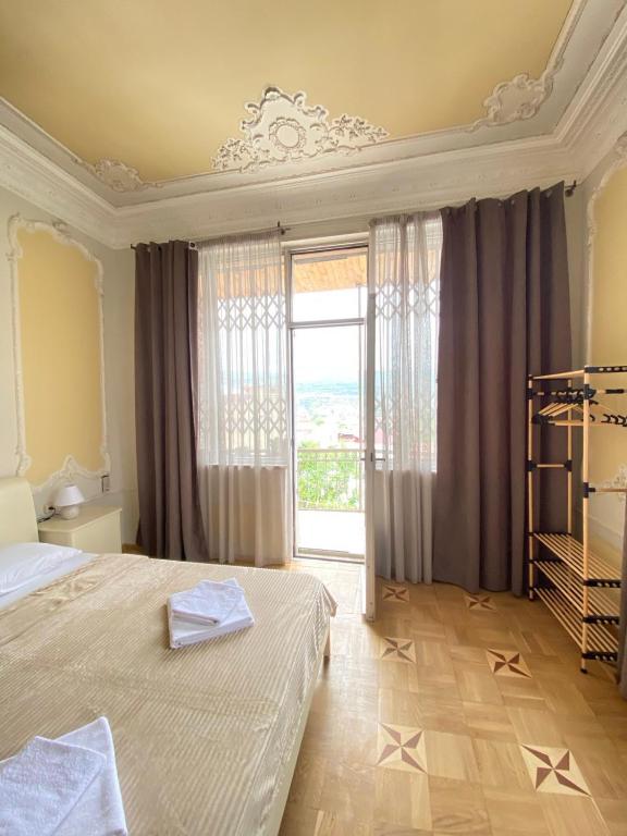 Postel nebo postele na pokoji v ubytování K&N Guesthouse