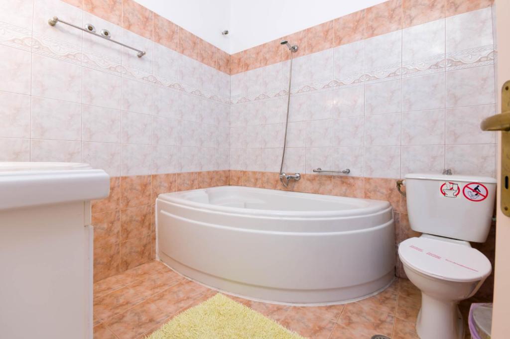 Koupelna v ubytování Villa Baronnos