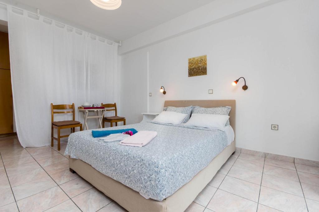 Postel nebo postele na pokoji v ubytování Villa Baronnos