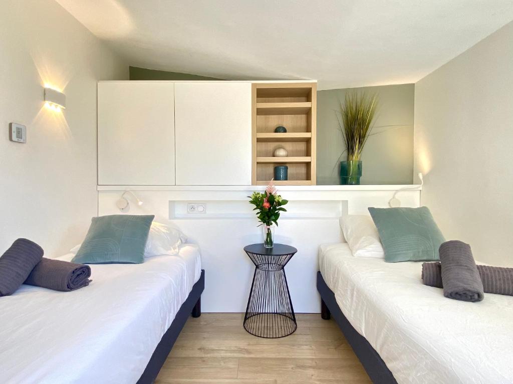 Posteľ alebo postele v izbe v ubytovaní Duplex Luxury Toîts du Soleil By SCLS Locations