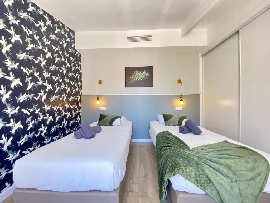 Posteľ alebo postele v izbe v ubytovaní Duplex Luxury Toîts du Soleil By SCLS Locations