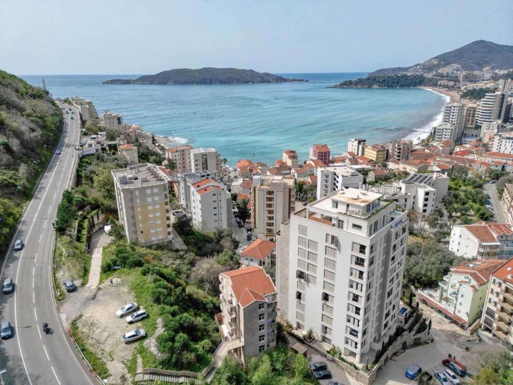 an aerial view of a city and the ocean at Petar Apartment in Rafailovici
