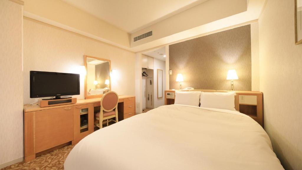 TV a/nebo společenská místnost v ubytování Crest Hotel Kashiwa