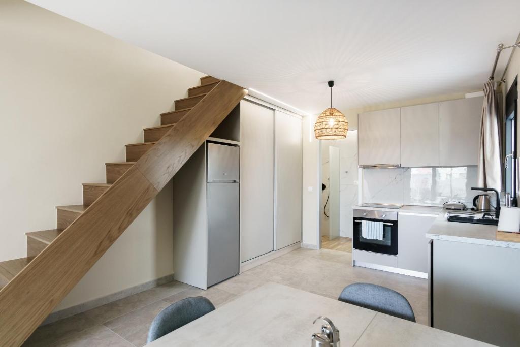 Kuchyň nebo kuchyňský kout v ubytování Mulberry Suites