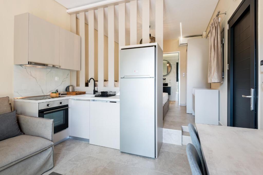Kuchyň nebo kuchyňský kout v ubytování Mulberry Suites