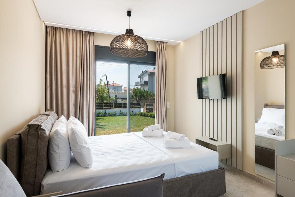 Postel nebo postele na pokoji v ubytování Mulberry Suites