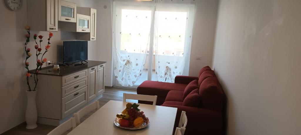 Μια τηλεόραση ή/και κέντρο ψυχαγωγίας στο AltaMarea Apartment