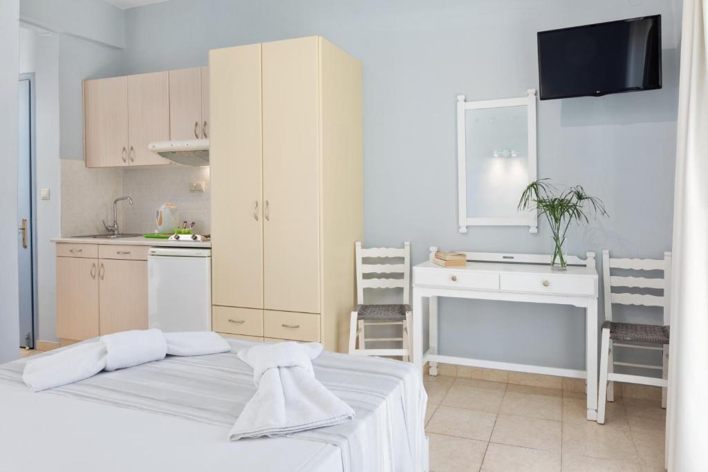 Postel nebo postele na pokoji v ubytování Bella Vista Beach Hotel