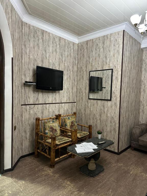 TV a/nebo společenská místnost v ubytování Hotel Piza