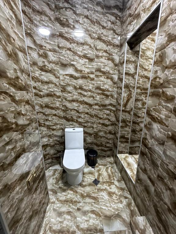 Koupelna v ubytování Hotel Piza