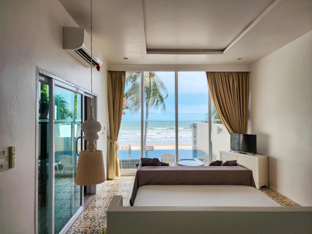 Postel nebo postele na pokoji v ubytování Bandara On Sea, Rayong