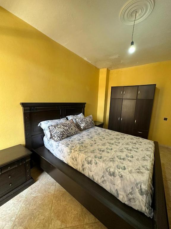 Postel nebo postele na pokoji v ubytování Villa le Palmier