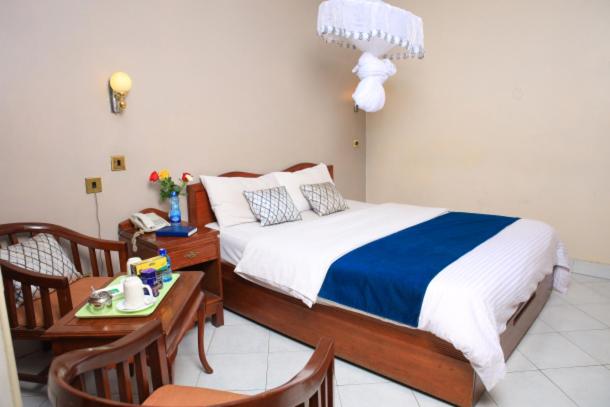 Postel nebo postele na pokoji v ubytování Paris Hotel