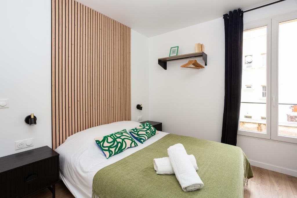 Postel nebo postele na pokoji v ubytování Maison Geranium