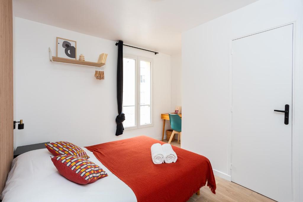 Postel nebo postele na pokoji v ubytování Maison Geranium