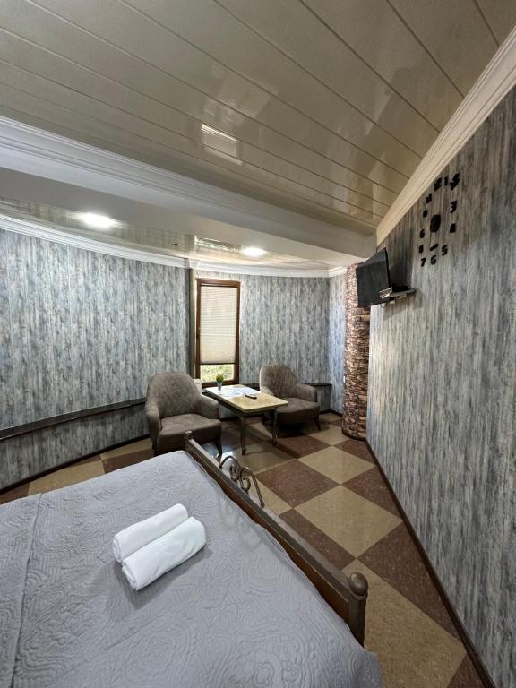 Postel nebo postele na pokoji v ubytování Hotel Piza