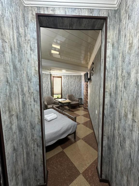 Postel nebo postele na pokoji v ubytování Hotel Piza