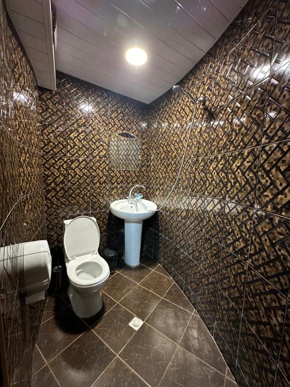 Koupelna v ubytování Hotel Piza