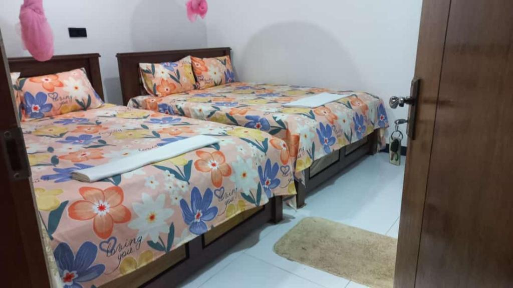 Postel nebo postele na pokoji v ubytování Sea Zone Hotel Nilaveli