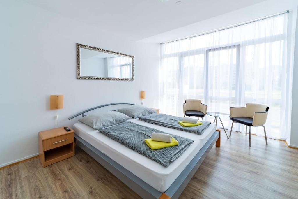 Postel nebo postele na pokoji v ubytování Hotel Palazzo