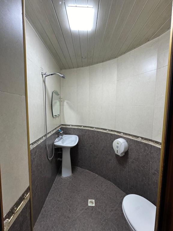 Koupelna v ubytování Hotel Piza