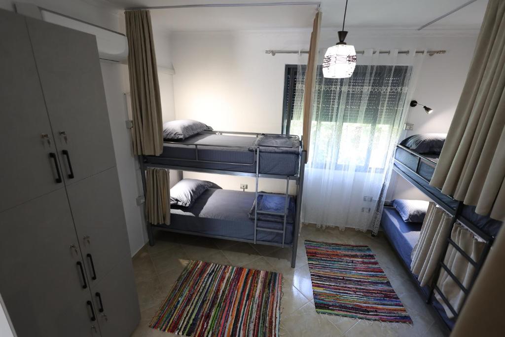 Letto o letti in una camera di Baza Hostel - Swimming Pool