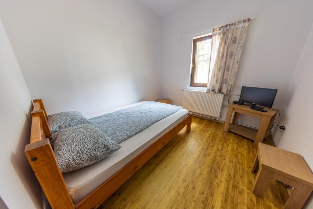 Postel nebo postele na pokoji v ubytování Hostel Gurasada