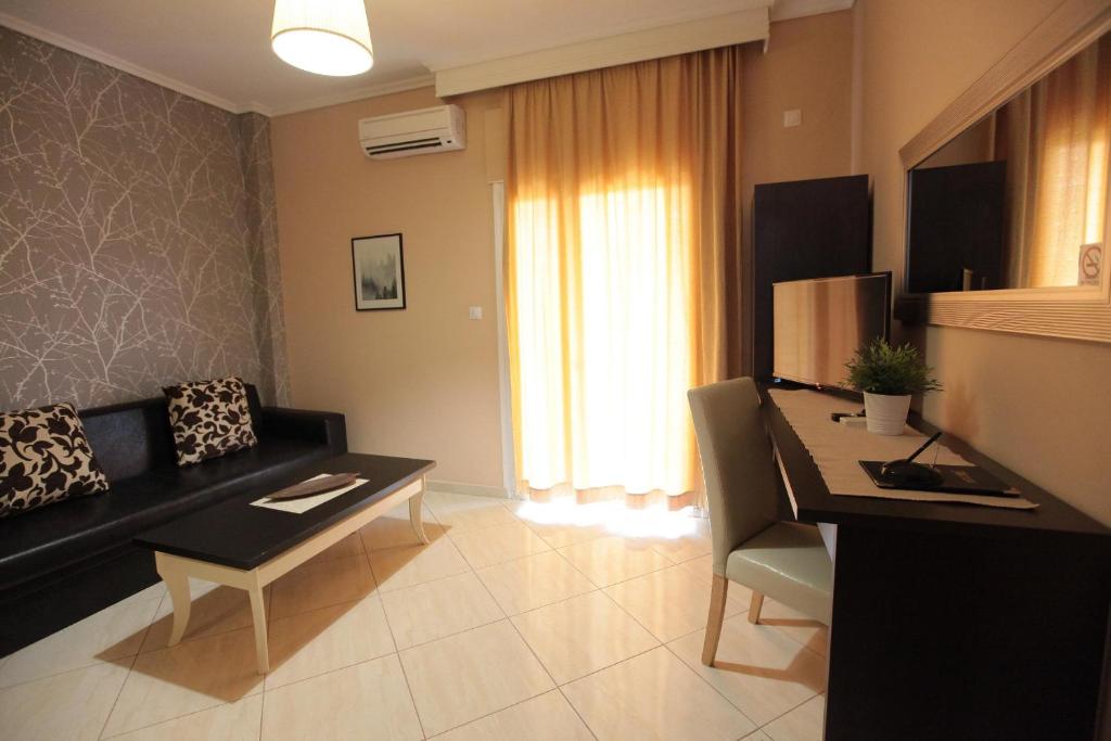 TV a/nebo společenská místnost v ubytování Hotel Epavli