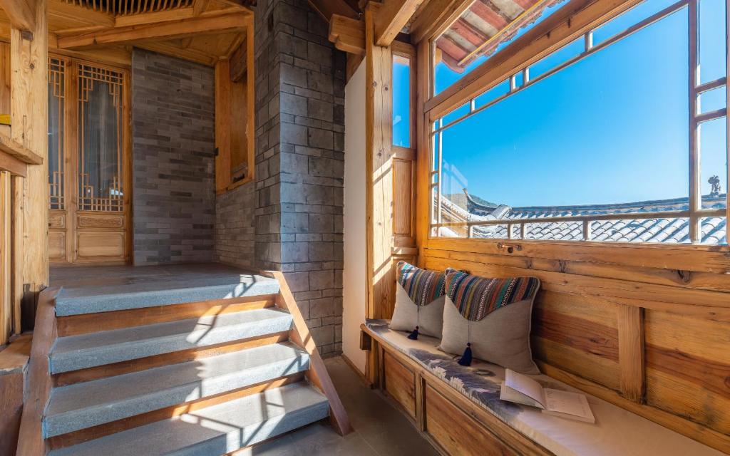 Balkón nebo terasa v ubytování Lijiang Zen Garden Hotel