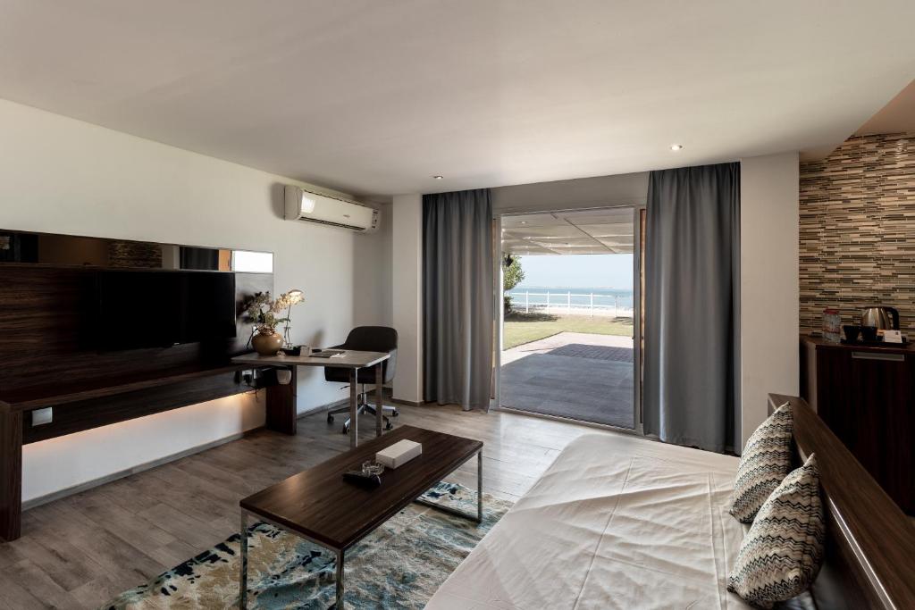 TV a/nebo společenská místnost v ubytování Barracuda Resort