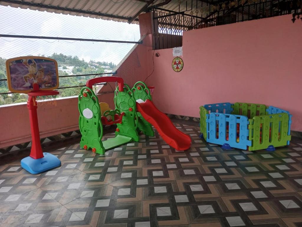 A área de jogos para crianças em Jayaraj Residency