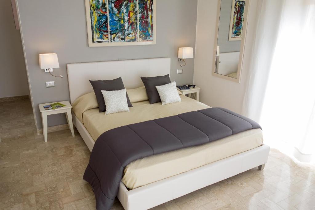 Letto o letti in una camera di Minturnae Hotel