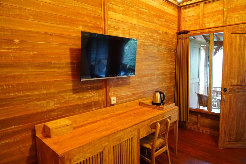 TV a/nebo společenská místnost v ubytování LASTANA SUITE UBUD