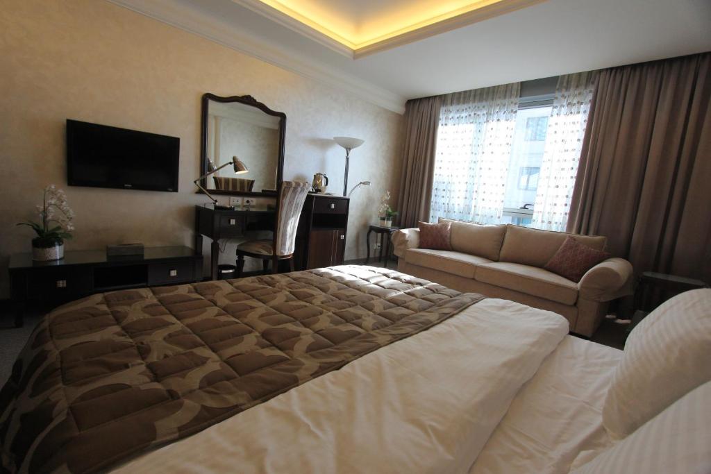 Postel nebo postele na pokoji v ubytování Elite Hotel By Beverly