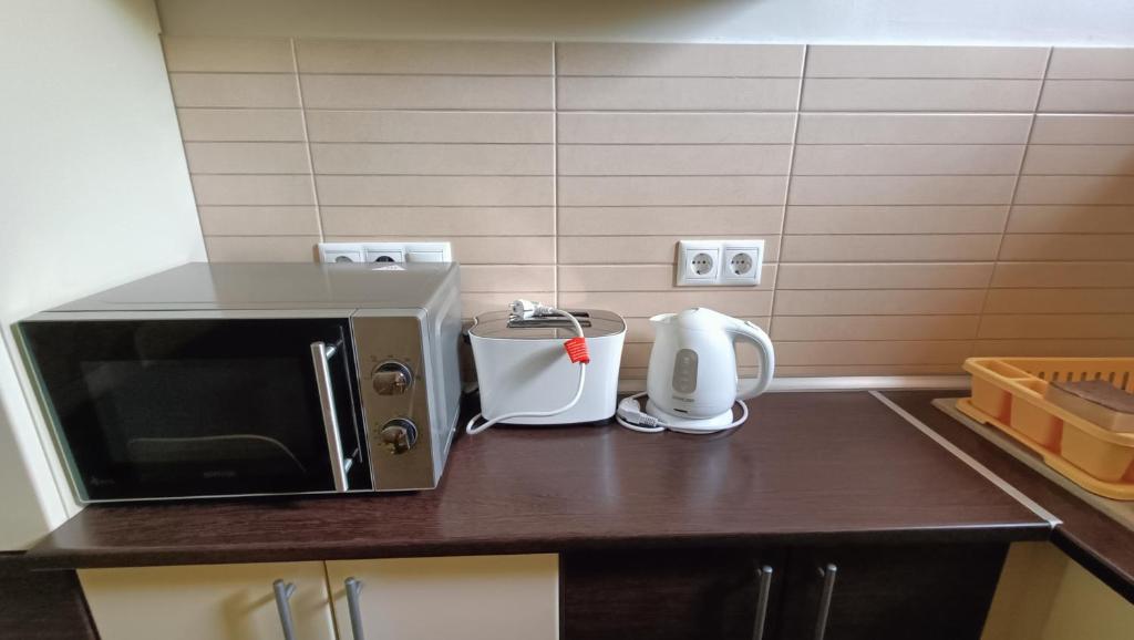 Kuchyňa alebo kuchynka v ubytovaní NewIsland Family Apartman