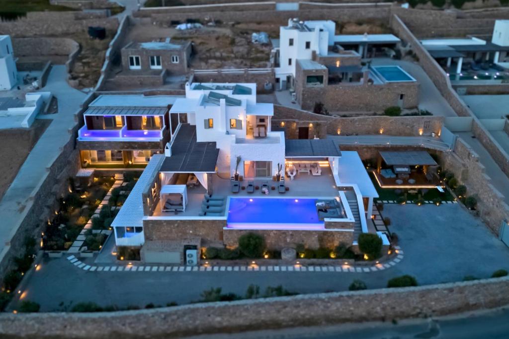 an aerial view of a villa with a swimming pool at VILLA PANAMERA Mykonos, Private Heaven, Supreme View! in Fanari
