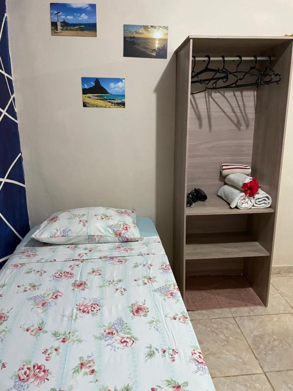 Postel nebo postele na pokoji v ubytování Estação Noronha