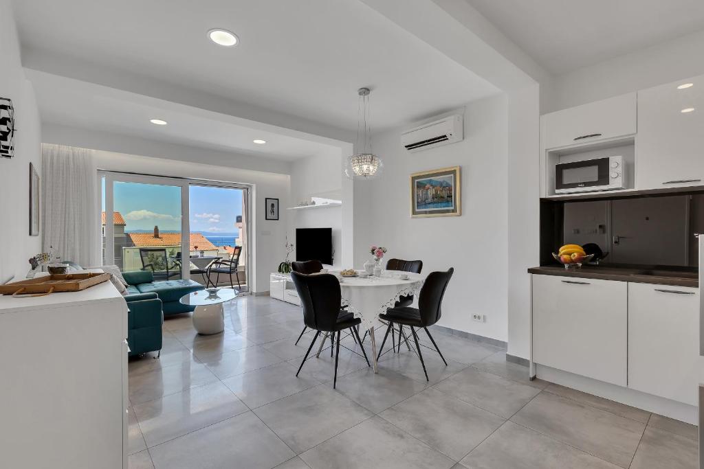 Kuchyň nebo kuchyňský kout v ubytování Apartments Dany