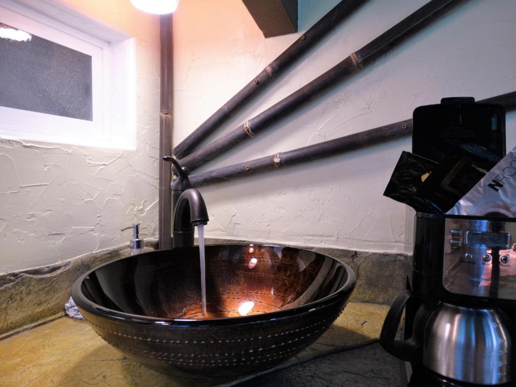 Příslušenství pro přípravu čaje a kávy v ubytování Chalet Kilauea