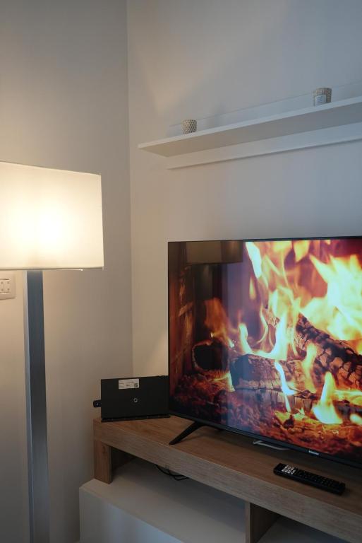 A television and/or entertainment centre at La Mia Casa Romana