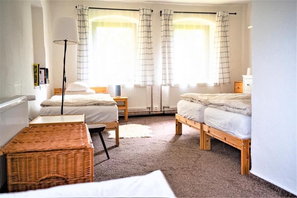 Postel nebo postele na pokoji v ubytování Chalupa U přátel