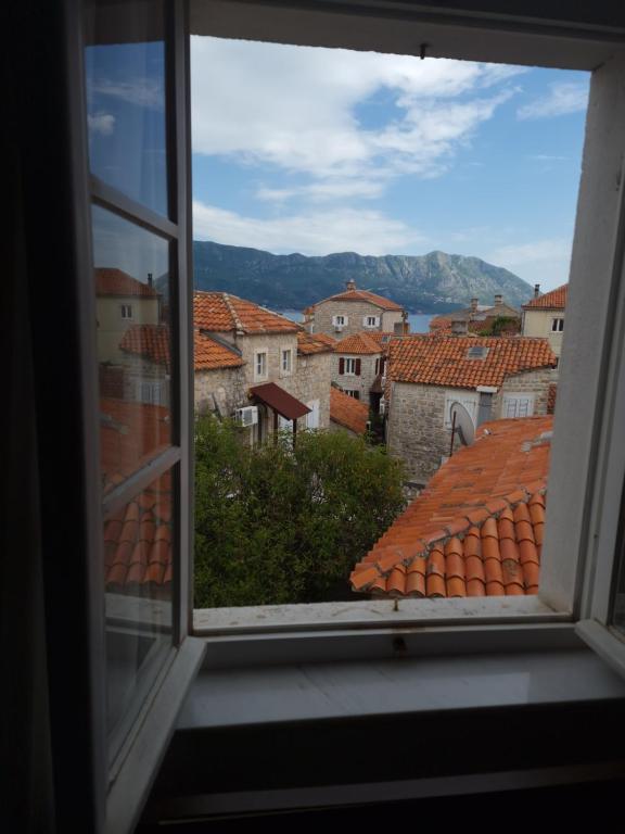 a view from a window of a city at Rooms Dana Old Town Budva in Budva