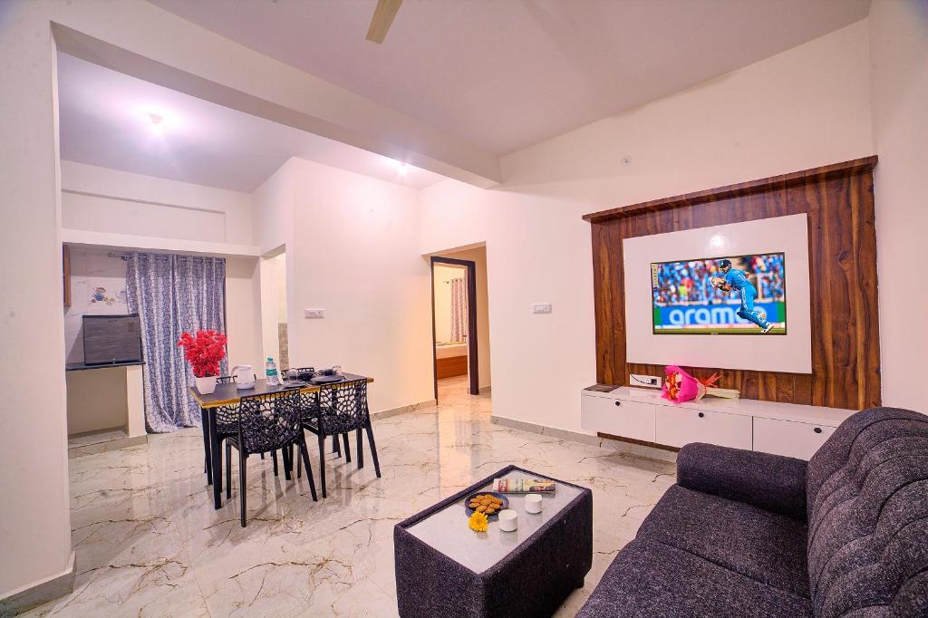 Posezení v ubytování Hotel Airport Southgate Bangalore