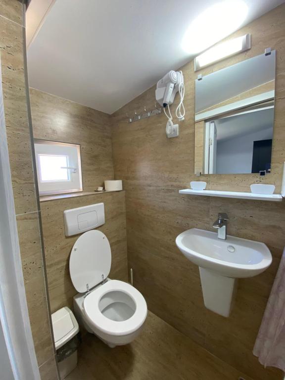 Koupelna v ubytování Casa Ciobi
