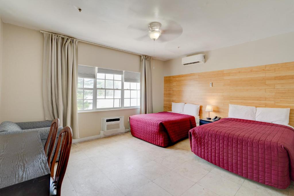Postel nebo postele na pokoji v ubytování James Hotel